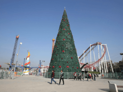 Iraqi Christians have raised a 30-ft. tall Christmas tree in Baghdad to celebrate both the