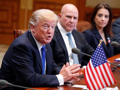 US President Donald J. Trump (L) sits beside National Security Advisor HR McMaster (2nd L) as he talks with South Korea's President Moon Jae-In during their summit meeting at the presidential Blue House in Seoul on November 7, 2017. US President Donald Trump arrived in Seoul on November 7 vowing …