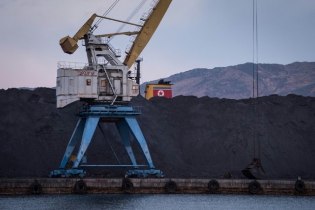 A mound of unsold North Korean coal at Rajin harbour in the Rason Special Economic Zone