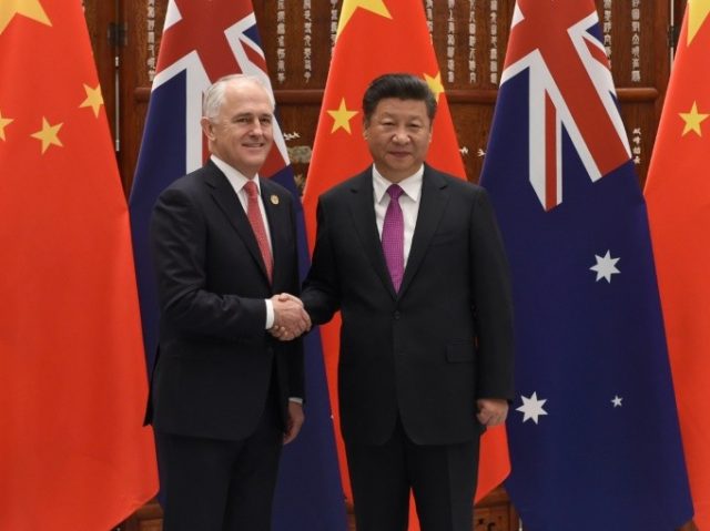 Australia's Prime Minister Malcolm Turnbull, seen here with Chinese President Xi Jinping, told Beijing he was merely defending Australian interests after a row over alleged foreign interference