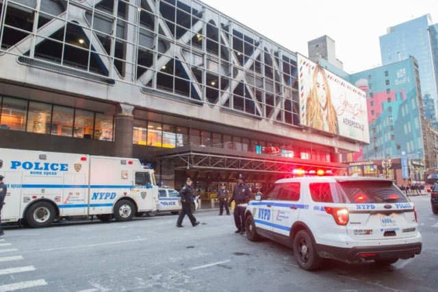 Police and first responders rush to reports of an explosion at the busy Port Authority Bus