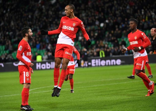 Monaco's Fabio Henrique Fabinho (2-L) celebrates after scoring a goal during their match a