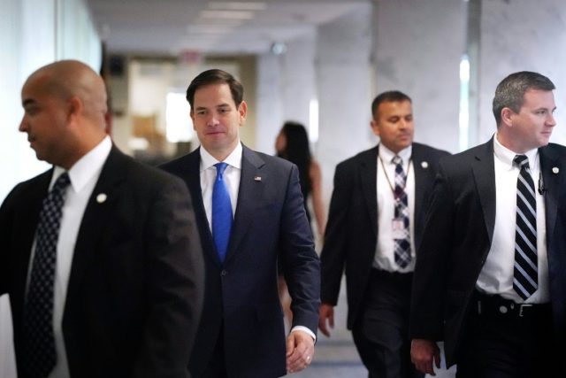 Florida Senator Marco Rubio (blue tie) threatened to vote against the tax bill if his dema