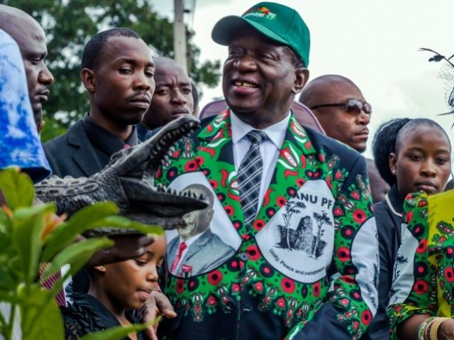 President Emmerson Mnangagwa received a statue of a crocodile -- his nickname -- after pla