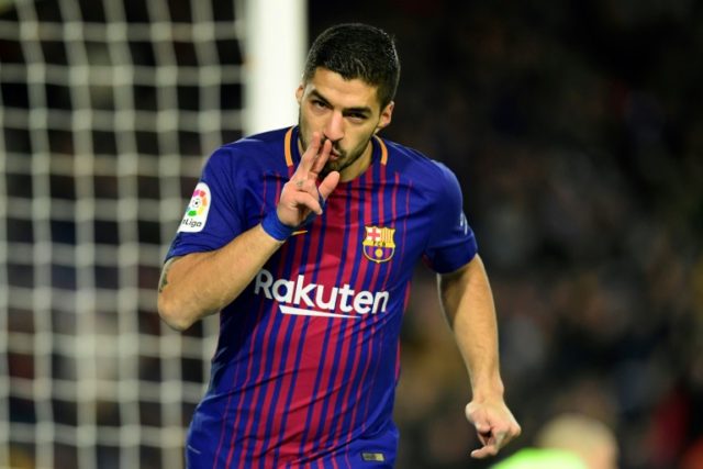 Barcelona's forward Luis Suarez celebrates after scoring his second goal during the Spanis
