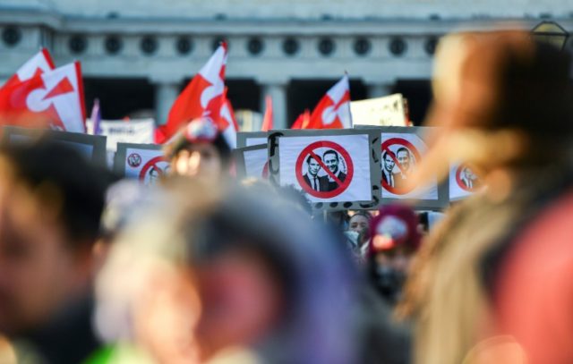 Demonstrators protest against the new Austrian government near the presidential palace in