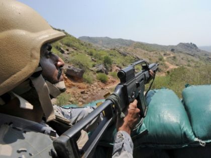 Saudi border guards keep watch along the border with Yemen