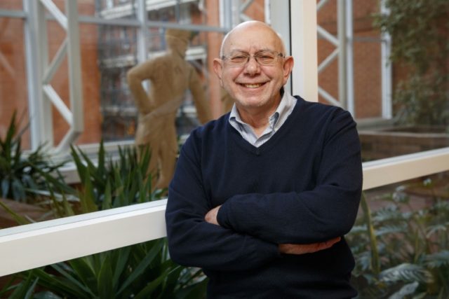 Football agent Mel Stein poses for a photo at Clintons Solicitors office in London, on Dec