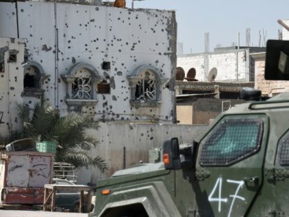 Saudi troops patrol the Shiite-majority town of Awamiya on October 1, 2017 as they seek to put down a wave of unrest triggered by their demolition of its historic Musawara neighbourhood