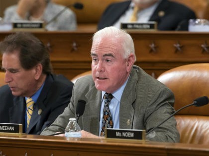 Rep. Pat Meehan, R-Pa., with Rep. Jim Renacci, R-Ohio, left, work on the markup of the GOP's far-reaching tax overhaul, on Capitol Hill in Washington, Monday, Nov. 6, 2017. (AP Photo/J. Scott Applewhite)