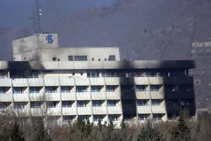 fghan security personnel are seen at the roof of Intercontinental Hotel after an attack in