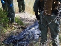 Body of Illegal Alien in South Texas Border Patrol Agents and Brooks County Sheriff's Office Deputies recover the body of an illegal immigrant in Brooks County. (File Photo: Bob Price/Breitbart Texas)