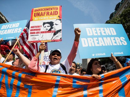 WASHINGTON, DC - SEPTEMBER 5: Demonstrators march during a demonstration in response to the Trump Administration's announcement that it would end the Deferred Action for Childhood Arrivals (DACA) program on September 5, 2017 in Washington, DC. DACA, an immigration policy passed by former President Barack Obama, allows certain undocumented immigrants …