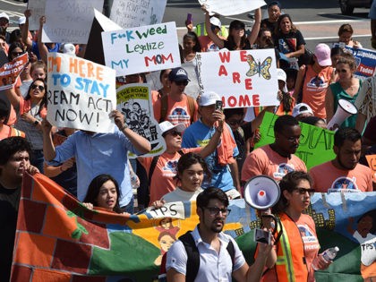 Immigrants and supporters demonstrate during a rally in support of the Deferred Action for