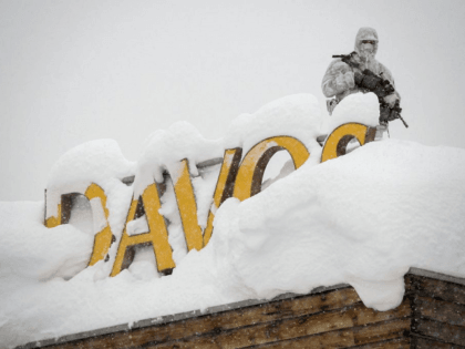 Trump wins Davos raves for 'landmark' tax cut
