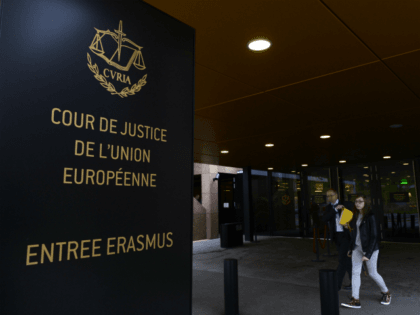 People walk away from the entrance of the European Court of Justice (SCJ) in Luxembourg, on October 5, 2015. The European Court of Justice (ECJ) on October 6, 2015 is to announce a verdict in the case of Schrems v Data Protection Commissioner of Ireland over Schrems's claims that his …