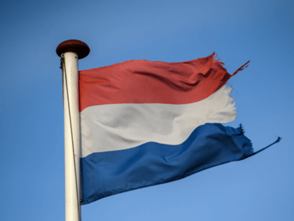 VENLO, NETHERLANDS - FEBRUARY 21: A Dutch flag flies on the country's border with Germany on February 21, 2017 in Venlo, Netherlands. The Dutch will vote in parliamentary elections on March 15 in a contest that, according to some polls, is currently led by far-right candidate Geert Wilders, the leader …