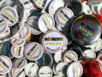 Pins of Italy's populist Five Star Movement (Movimento 5 Stelle - M5S) are seen during the party's congress in Rimini on September 23, 2017. Italy's populist 5-Star Movement announces its candidate for prime minister on September 23 as it braces to attempt a revolutionary shift from protest to ruling party. …