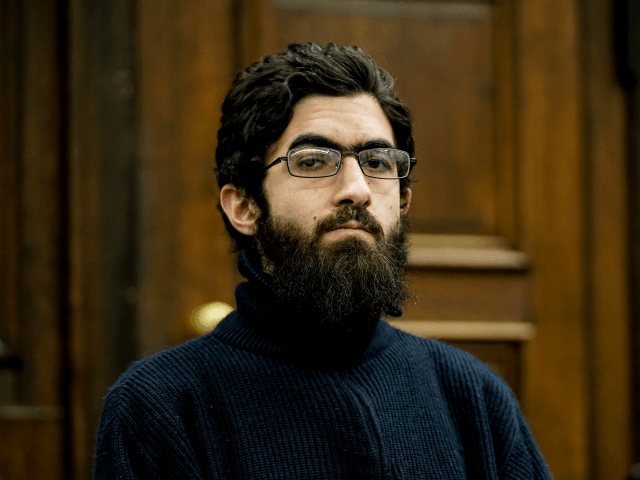 HAMURG, GERMANY - JANUARY 12: Ahmad A., 26, arrives for the first day of his trial on char