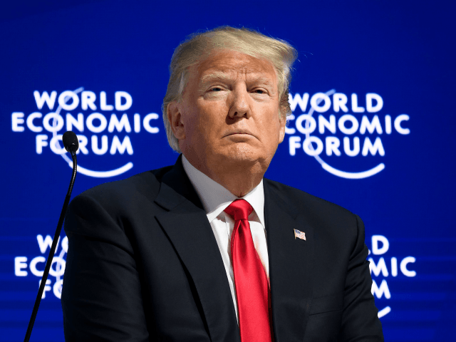US President Donald Trump looks on during a discussion after delivering his speech during the World Economic Forum (WEF) annual meeting on January 26, 2018 in Davos, eastern Switzerland. / AFP PHOTO / Fabrice COFFRINI (Photo credit should read FABRICE COFFRINI/AFP/Getty Images)