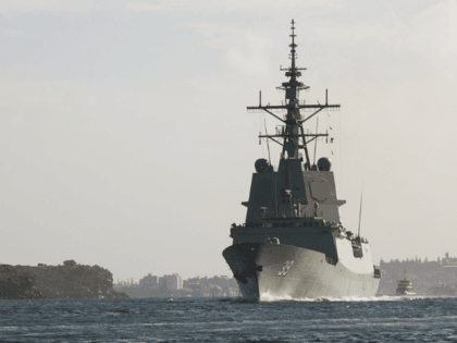 The new Australian-built Guided Missile Destroyer HMAS Hobart enters Sydney Harbour on com