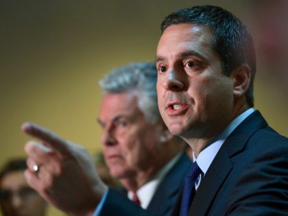 House Intelligence Committee Chairman Rep. Devin Nunes, R-Calif., right, standing with Rep. Peter King, R-N.Y., left, speaks on Capitol Hill in Washington, Tuesday, Oct. 24, 2017. (AP Photo/Susan Walsh)