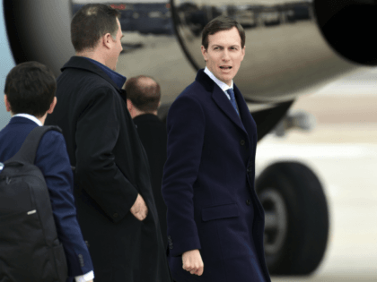 White House adviser Jared Kushner, center, prepares to board Air Force One at Andrews Air Force Base in Md., Monday, Jan. 8, 2018, as he travels with President Donald Trump to Tennessee. Trump is set to become the first president in a quarter century to address the annual convention of …