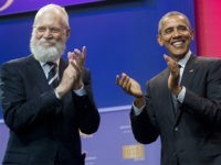 LettermanObamaNetflix US President Barack Obama applauds alongside former talk show host David Letterman during a celebration of the 5th anniversary of Joining Forces and the 75th anniversary of the USO at Andrews Air Force Base in Maryland, May 5, 2016. / AFP / SAUL LOEB (Photo credit should read SAUL LOEB/AFP/Getty …