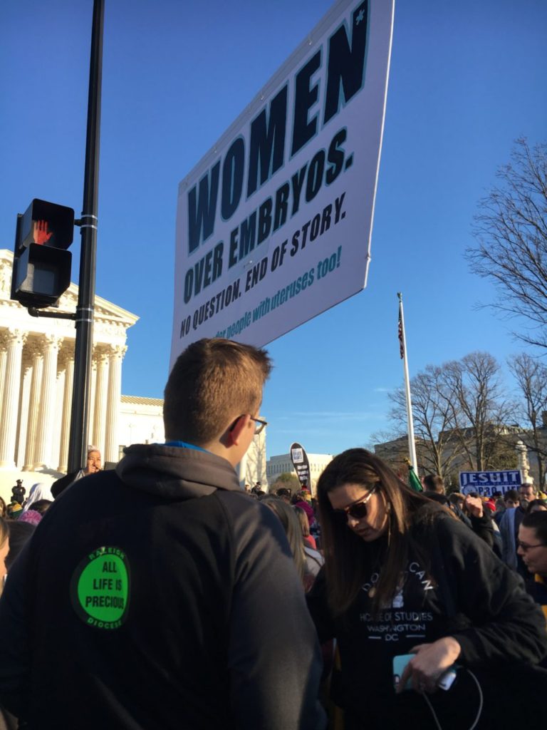 At the March for Life on January 19, 2018, a woman prays for someone.