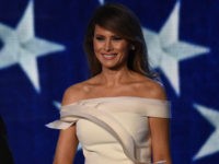 MelaniaHervePierreAnniversaryInaugural US President Donald Trump and First Lady Melania Trump take the stage at the Freedom Inaugural Ball, January 20, 2017, in Washington, DC. / AFP / Robyn Beck (Photo credit should read ROBYN BECK/AFP/Getty Images)