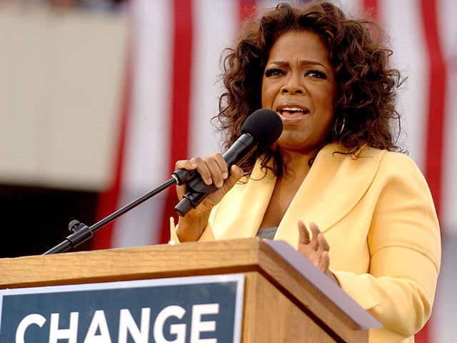 COLUMBIA, SC - DECEMBER 9: Talk show host Oprah Winfrey introduces Democratic presidential hopeful Sen. Barack Obama (D-IL) to a crowd of 29,000 during a campaign event at the William Bryce Football Stadium on December 9, 2007 in Columbia, South Carolina. Obama and Winfrey are scheduled to make one more …