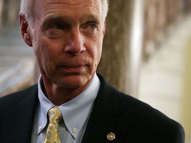 WASHINGTON, DC - DECEMBER 01: U.S. Sen. Ron Johnson (R-WI) listens to a question from a member of the press at the Capitol December 1, 2017 in Washington, DC. Senate GOPs indicate that they have enough votes to pass the tax reform bill. (Photo by Alex Wong/Getty Images)