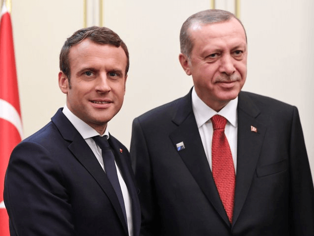 FILE - This is a Thursday May 25, 2017 file photo of French President Emmanuel Macron, left, and Turkish President Recep Tayyip Erdogan as they pose during their meeting which is on the sidelines of the NATO summit, in Brussels. Erdogan is trying to bring Turkey’s relations with European nations …