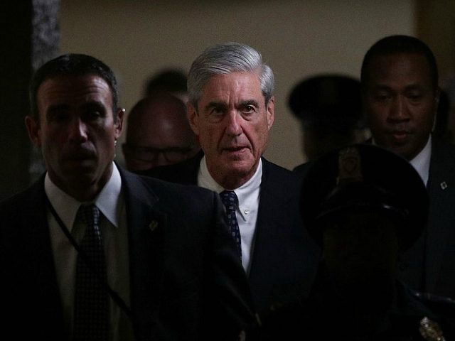 WASHINGTON, DC - JUNE 21: Special counsel Robert Mueller (2nd L) leaves after a closed meeting with members of the Senate Judiciary Committee June 21, 2017 at the Capitol in Washington, DC. The committee meets with Mueller to discuss the firing of former FBI Director James Comey. (Photo by Alex …