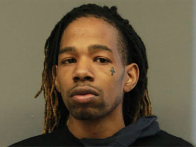 A Chicago man was arrested on robbery and gun charges after shooting himself in the hand w