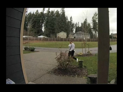 A suspected package thief in Washington state had some bad karma coming her way after a surveillance video appeared to show her attempting to steal a package from someone’s front porch.