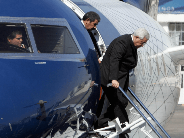 Amman, JORDAN: Palestinian leader Mahmud Abbas gets off the plane as he arrives in Amman 23 September 2006. Abbas, who was also in Cairo earlier today, said dialogue with Hamas on the formation of a national unity government had 'returned to zero' after the Islamist movement refused to recognise Israel. …