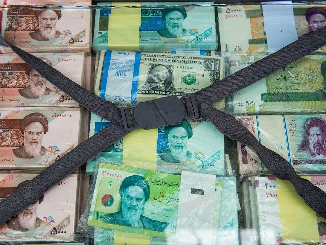 A briefcase filled with Iranian rial banknotes sits on display at a currency exchange mark