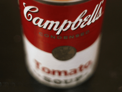 This Aug. 31, 2011 file photo shows an opened can of Campbell's Tomato soup in New York. Campbell Soup Co. said Tuesday, Nov. 22, 2011, fiscal first-quarter net income fell 5 percent as price increases were not enough to offset lower volume in its soup and beverage businesses (AP Photo/James …