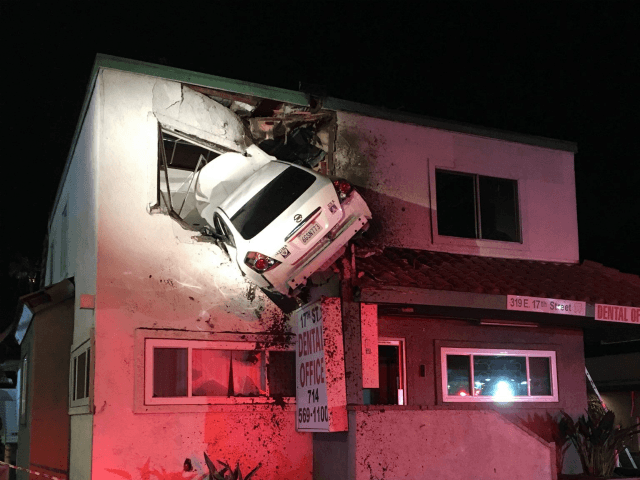 WATCH: Dash Cam Shows Car Fly Into Building's Second Story