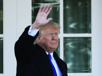 President Donald Trump waves to anti-abortion supporters and participants of the annual Ma