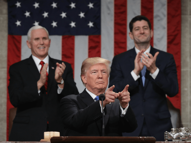 US President Donald Trump delivers the State of the Union address as US Vice President Mik