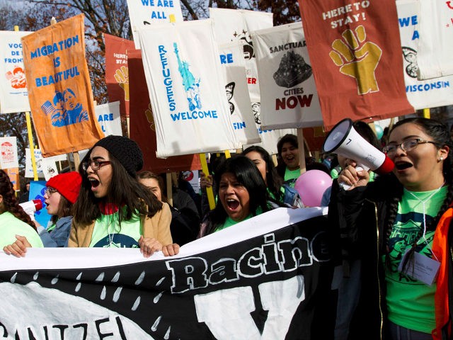 Demonstrators march during an immigration rally in support of the Deferred Action for Chil