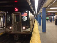 e-train-new-york-city-subway-getty E train arrives at World Trade Center subway station .