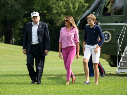 President Donald Trump, First Lady Melania Trump, and their 11-year-old son Barron, walk across the South Lawn, after returning to the White House from a weekend at Camp David, on Sunday, August 27, 2017. (Photo by Cheriss May) (Photo by Cheriss May/NurPhoto via Getty Images)