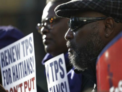 Immigration advocates rally in New York on Tuesday, Nov. 21, 2017, to protest the decision by the Department of Homeland Security to terminate Temporary Protected Status for people from Haiti. The Homeland Security Department said conditions in Haiti have improved significantly, so the benefit will be extended until July 2019 …