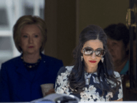 Top Clinton aide Huma Abedin walks ahead of Democratic presidential candidate Hillary Clinton following a private meeting with Sen. Elizabeth Warren, D-Mass., Friday, June 10, 2016, at Clinton's home in Washington. The FBI has obtained a warrant to begin reviewing newly discovered emails that may be relevant to the Hillary …