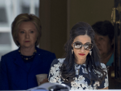 Top Clinton aide Huma Abedin walks ahead of Democratic presidential candidate Hillary Clinton following a private meeting with Sen. Elizabeth Warren, D-Mass., Friday, June 10, 2016, at Clinton's home in Washington. The FBI has obtained a warrant to begin reviewing newly discovered emails that may be relevant to the Hillary …