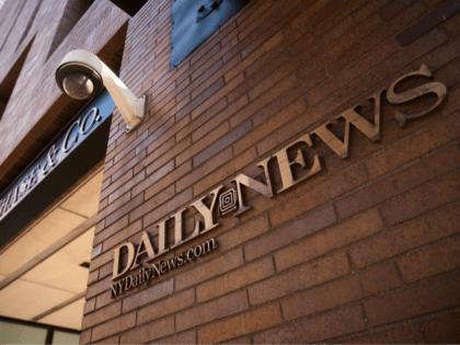 Signage for the New York Daily News is displayed on the facade of their Broad Street office, September 5, 2017 in New York City. Tronc, the publisher of the Chicago Tribune and The Los Angeles Times newspapers, announced on Monday that is had purchased The New York Daily News. Previously …