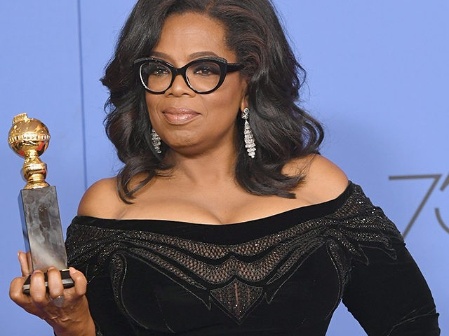 BEVERLY HILLS, CA - JANUARY 07: Oprah Winfrey poses with the Cecil B. DeMille Award in the press room during The 75th Annual Golden Globe Awards at The Beverly Hilton Hotel on January 7, 2018 in Beverly Hills, California. (Photo by Kevin Winter/Getty Images)